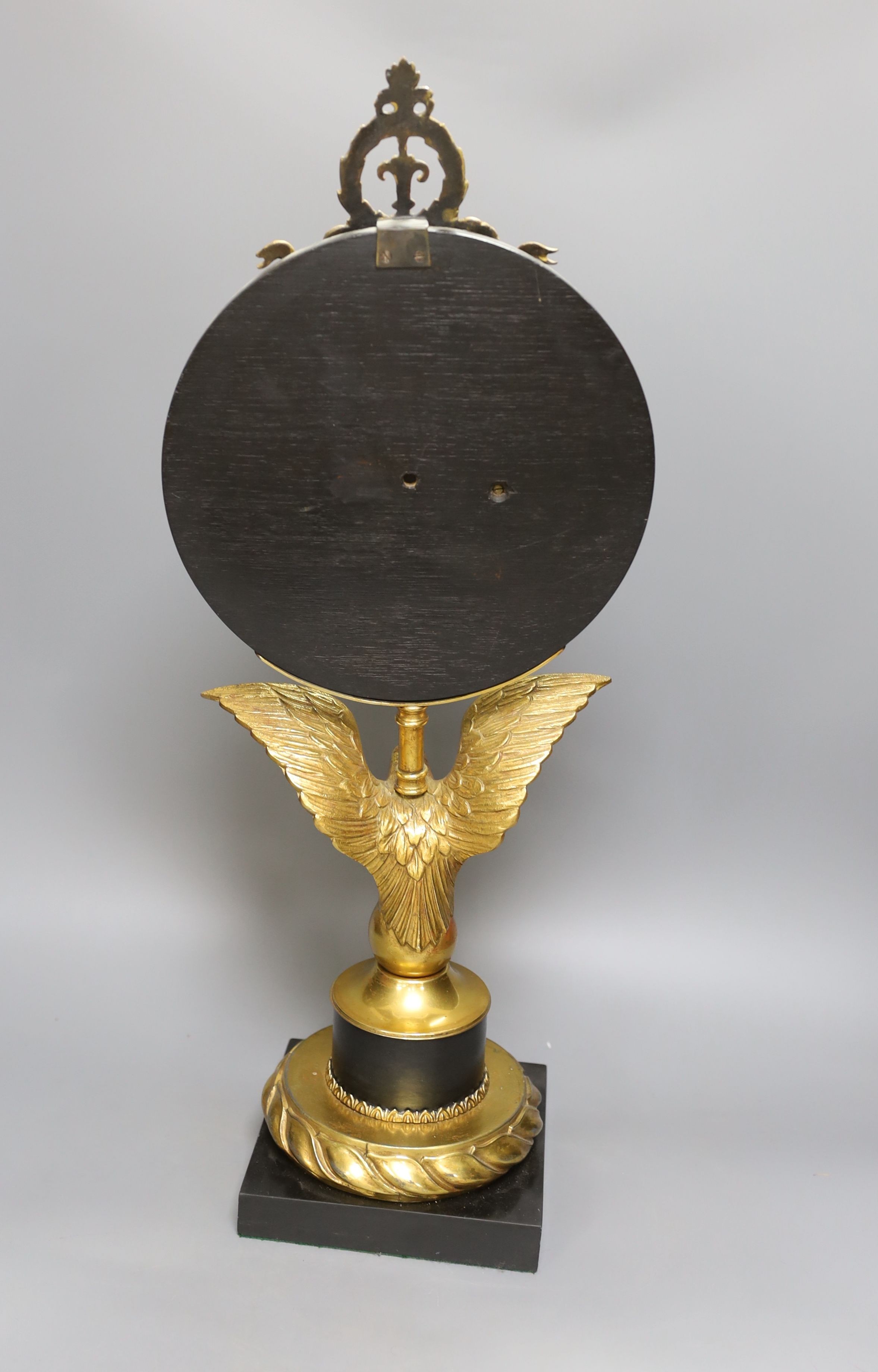 A large desk barometer on a gilt metal eagle mount - 58.5cm tall